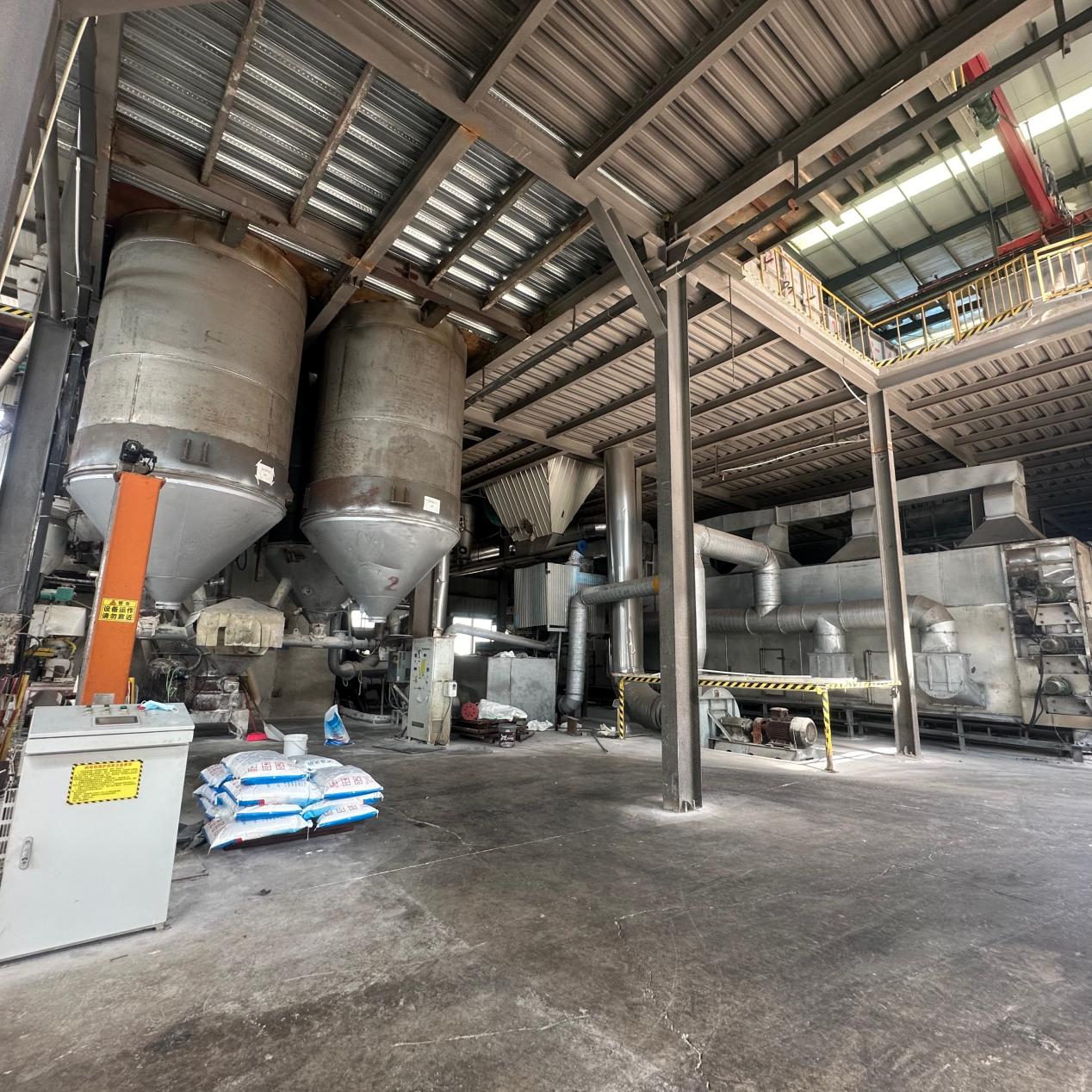Large production workshop photo for the 2018 plant expansion milestone